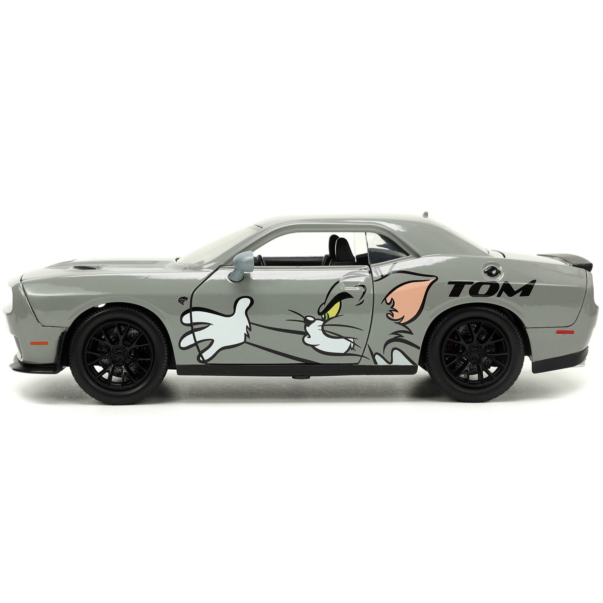 2015 Dodge Challenger Hellcat Gray with “Tom” Graphics and Jerry Diecast Figure “Tom and Jerry” “Hollywood Rides” Series 1/24 Diecast Model Car by Jada
