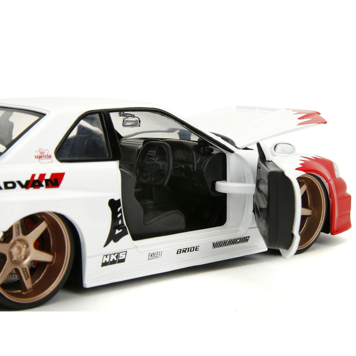 2002  Skyline Gt-R (R34) Rhd (Right Hand Drive) White With Red Graphics And Ryu Diecast Figure 'Street Fighter' Video Game 'Anime Hollywood Rides' Series 1/24 Diecast Model Car By Jada