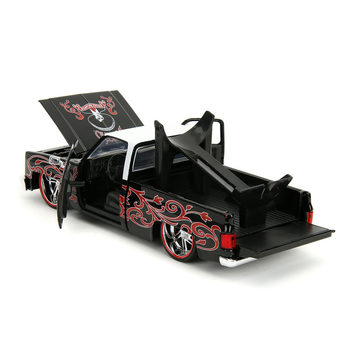1985 Chevrolet C-10 Pickup Truck Black With White Top And Graphics With Charro Man Diecast Figure 'Tapatio' 1/24 Diecast Model Car By Jada