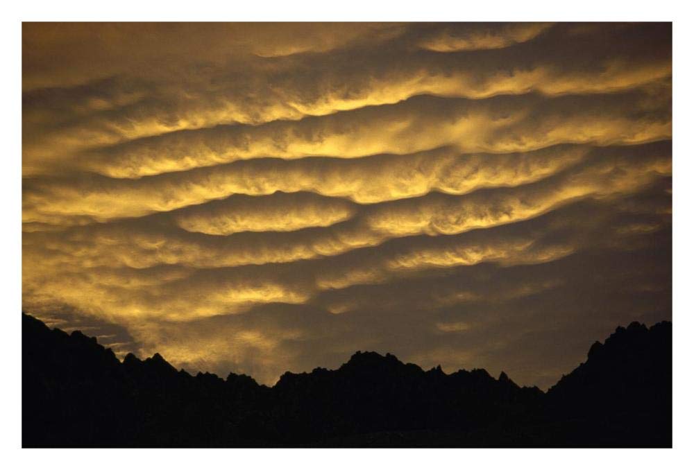 Cumulonimbus clouds at dawn above Norwest Arch, Ben Ohau Range, Southern Alps, New Zealand-Paper Art-32x22”