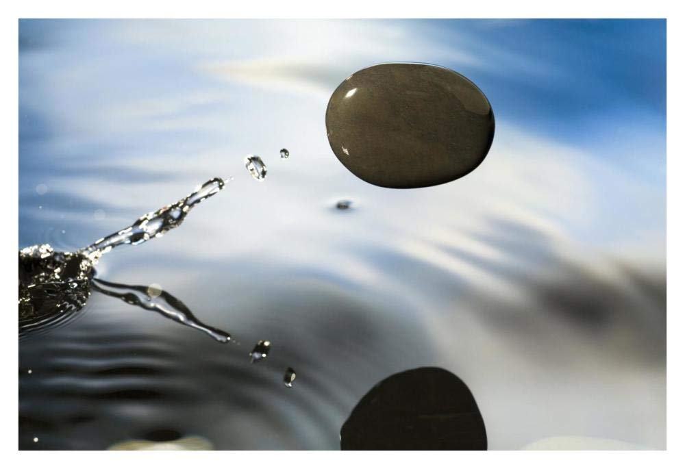 A rock skipping across the waters surface-Paper Art-38x26”