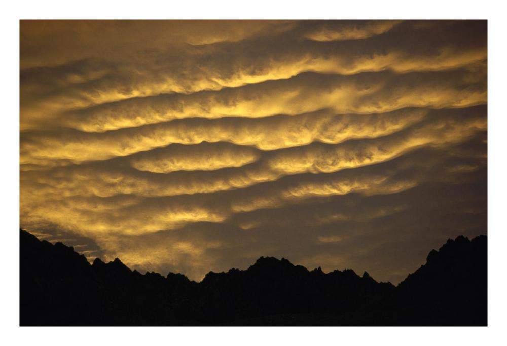 Cumulonimbus clouds at dawn above Norwest Arch, Ben Ohau Range, Southern Alps, New Zealand-Paper Art-26x18”