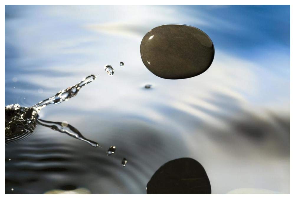 A rock skipping across the waters surface-Paper Art-62x42”