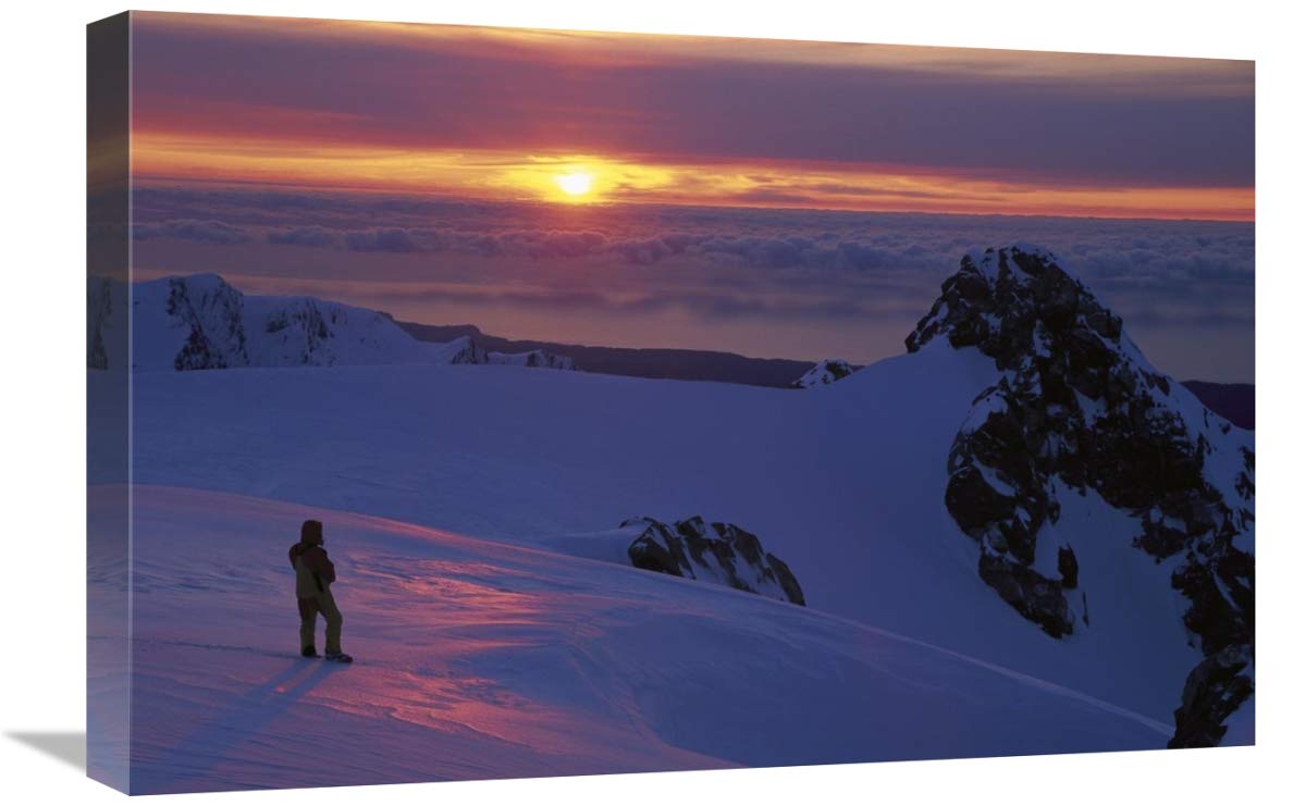 Skier on Franz Josef Glacier watching sunset over the Tasman Sea, Westland NP-Canvas Art-24x16”