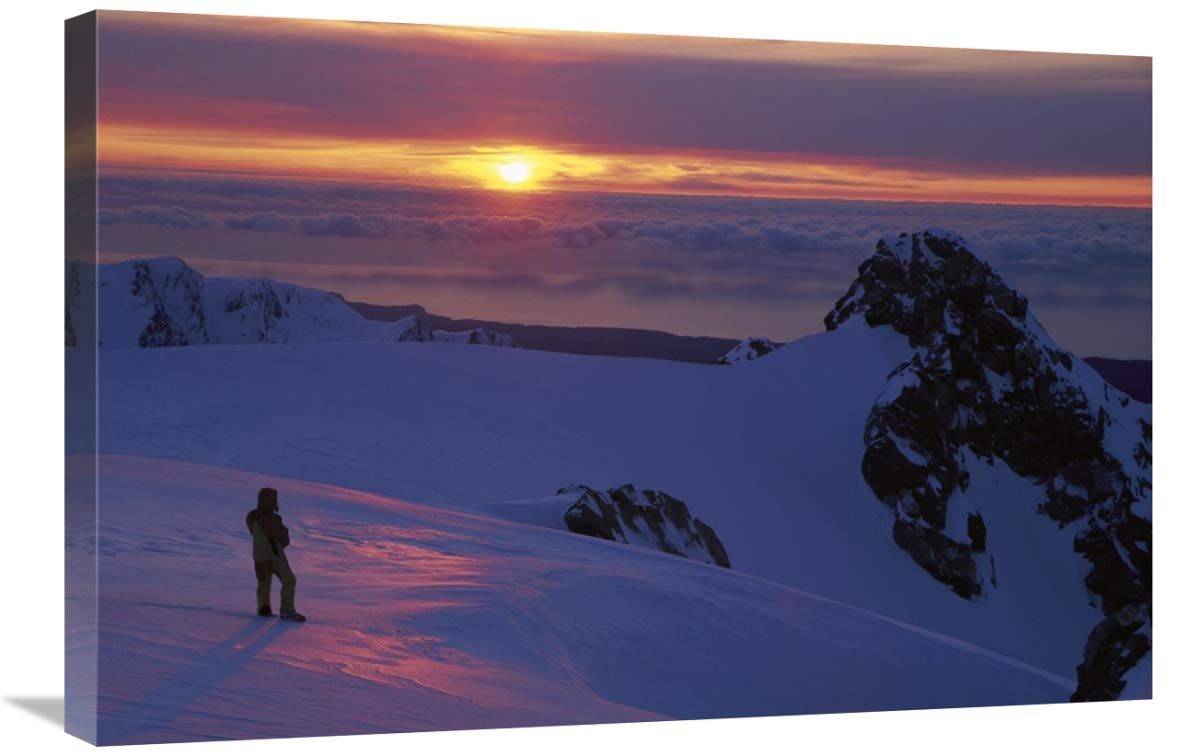 Skier on Franz Josef Glacier watching sunset over the Tasman Sea, Westland NP-Canvas Art-30x20”