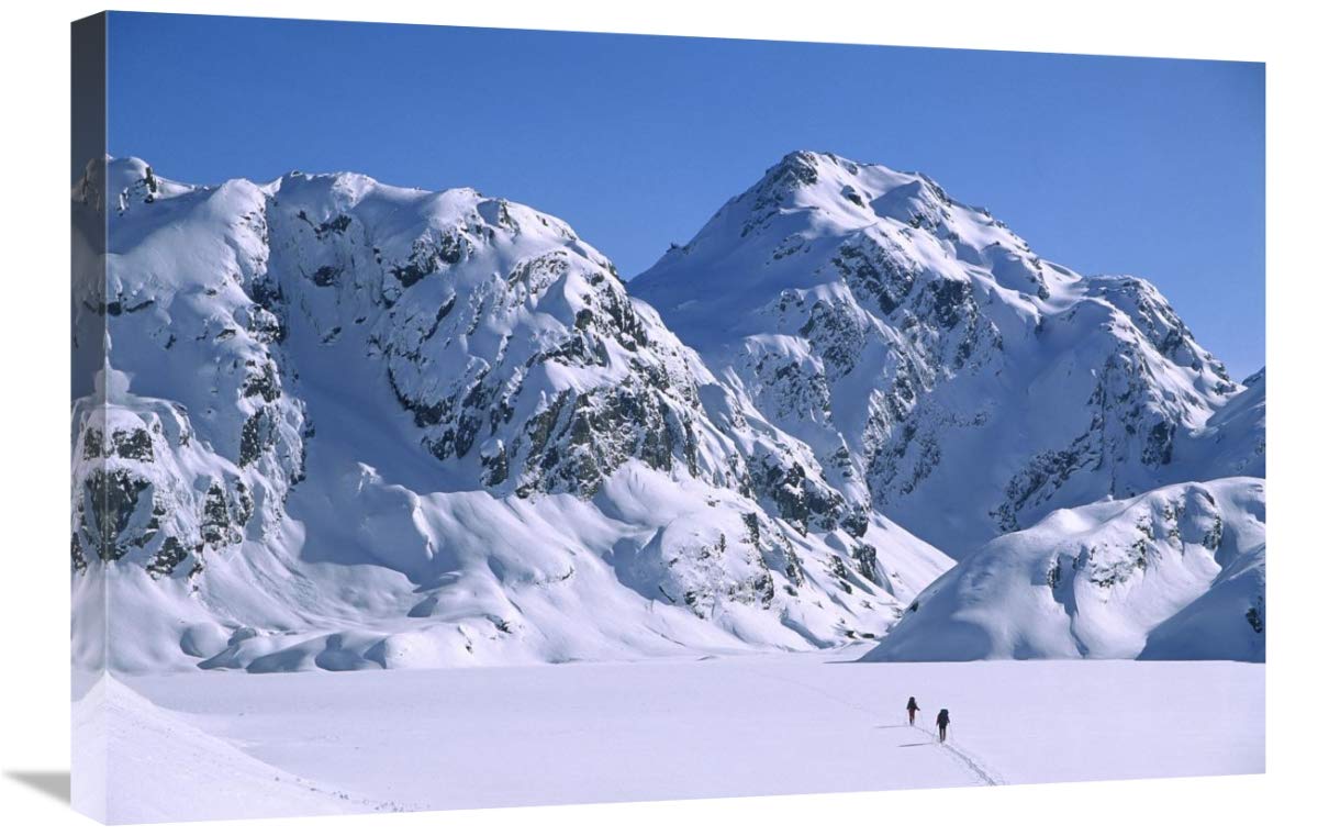 Skiers cross frozen Lake Harris, Routeburn Track, Mt Aspiring NP, New Zealand-Canvas Art-30x20”