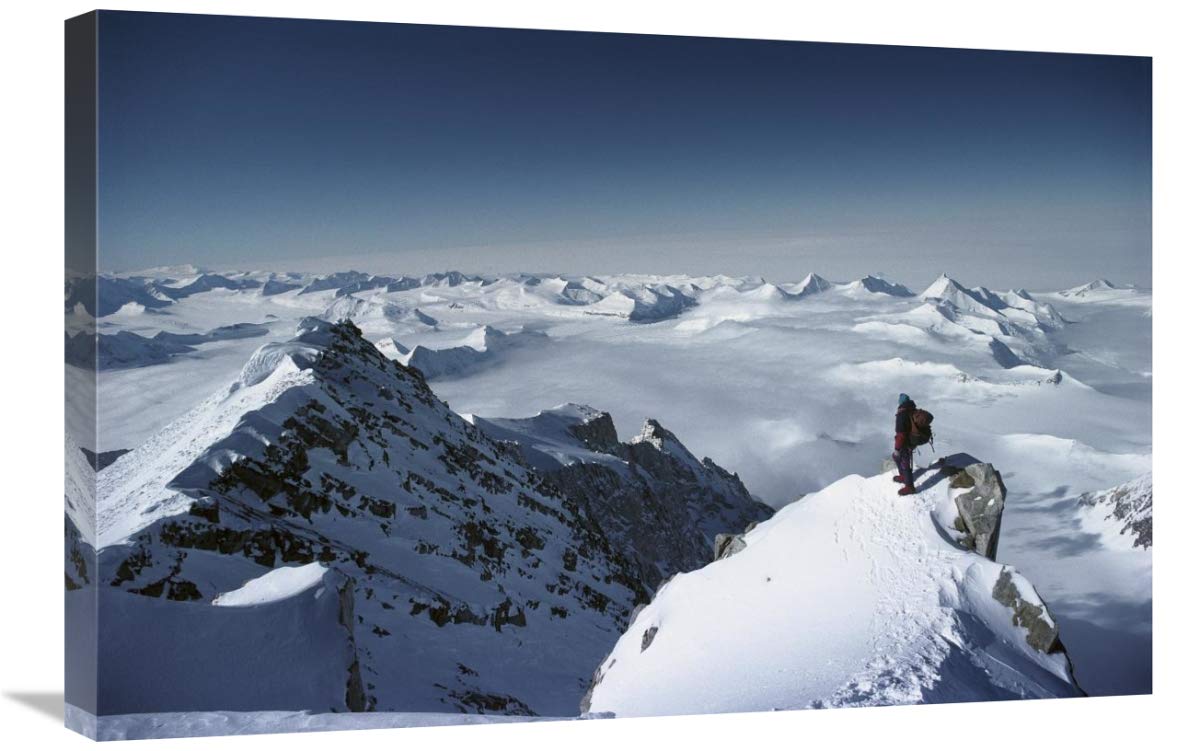 Climber on the summit of Mt Shinn, Ellsworth Mountains, Antarctica-Canvas Art-30x20”