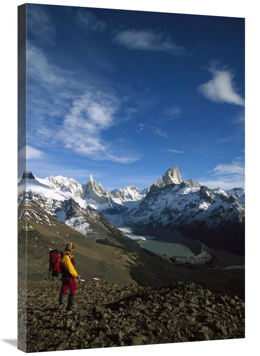 Hiker admiring Cerro Torre and Fitzroy, Los Glaciares NP, Patagonia-Canvas Art-24x36”