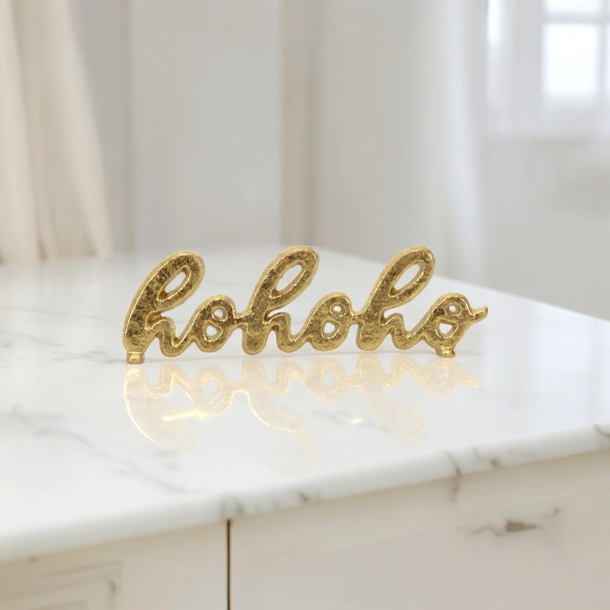 Clara “hohoho” Gold Cast Iron Table Sign