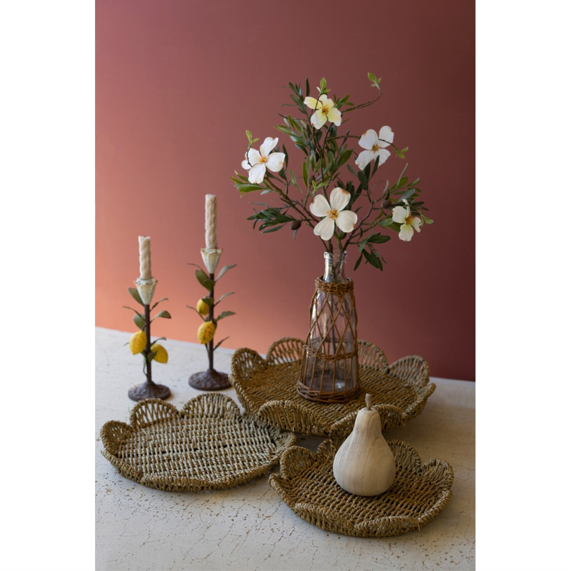 SET OF THREE FLOWER SHAPED WOVEN SEAGRASS TRAYS