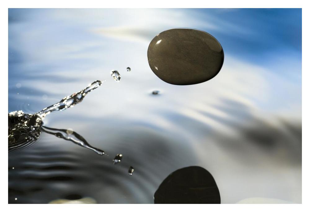 A Rock Skipping Across The Water'S Surface-Paper Art-20X14