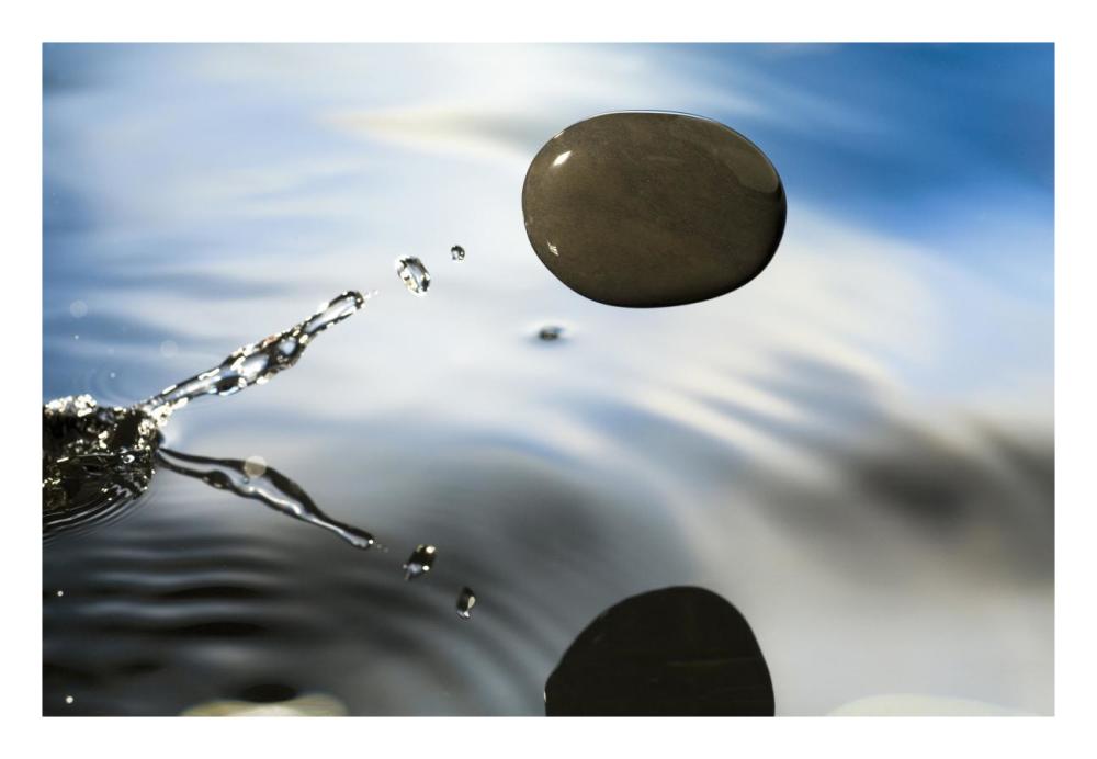 A Rock Skipping Across The Water'S Surface-Paper Art-26X18