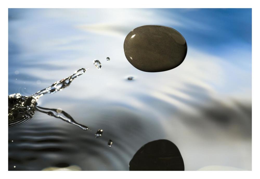 A Rock Skipping Across The Water'S Surface-Paper Art-32X22