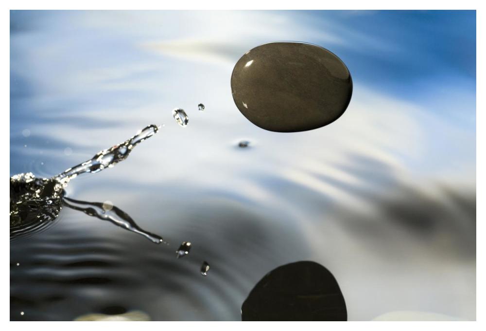 A Rock Skipping Across The Water'S Surface-Paper Art-50X34