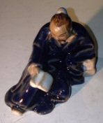 Ceramic Figurine<br>Man Reading Book